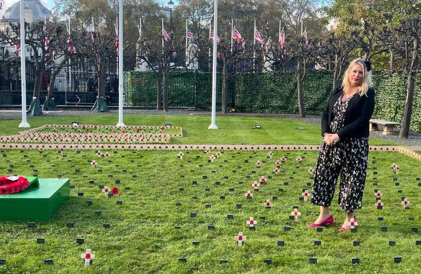 Mims Davies MP lays a Remembrance Cross in the Royal British Legion Constituency Garden of Remembrance at the Houses of Parliament