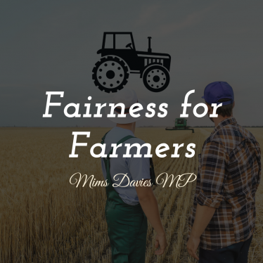 two farmers in field