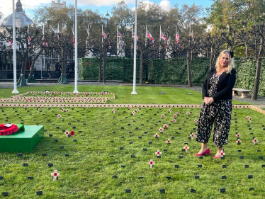 Mims Davies MP lays a Remembrance Cross in the Royal British Legion Constituency Garden of Remembrance at the Houses of Parliament